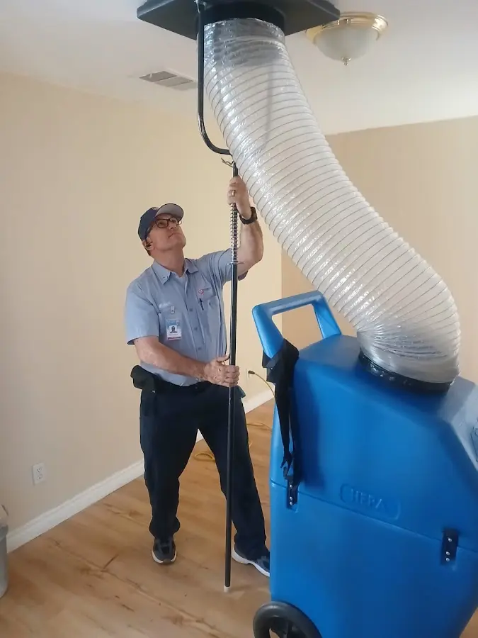 Mini Split Installation technician using HEPA equipment in Fontana